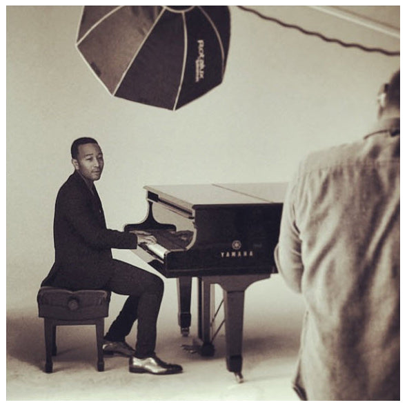 John Legend on set wearing the Brandenburgs