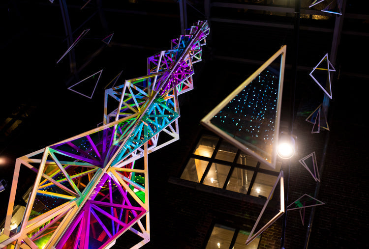 25 foot tall multichromatic Christmas tree on display at Fluevog Gastown