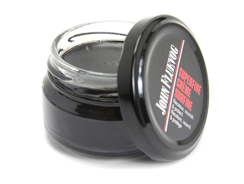 black - A jar of Fluevog leather conditioner in the colour black